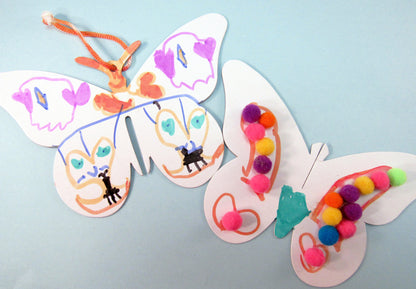 3-dimensional butterfly art project - Ivy Kids Educational Activity Kit featuring the book Gotta Go! Gotta Go! by Sam Swope and over 10 art, literacy, math, and science activities inspired by the story. Learn about monarch butterflies. Perfect kit for spring.