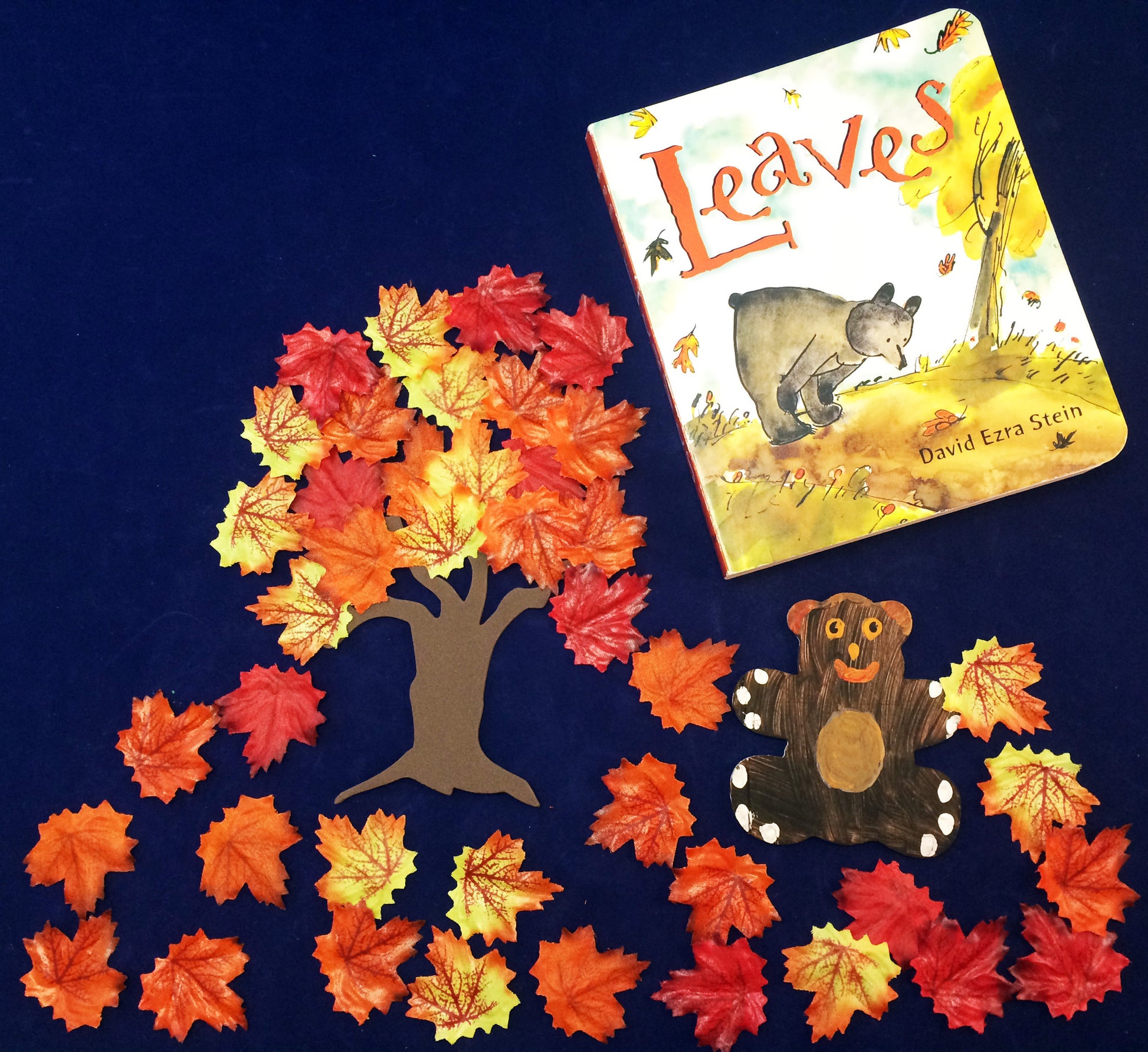 Retelling the story of Leaves by David Ezra Stein with silk leaves and foam trees