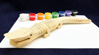 Painting a wooden alligator - art activity to go with Leo Lionni An Extraordinary Egg