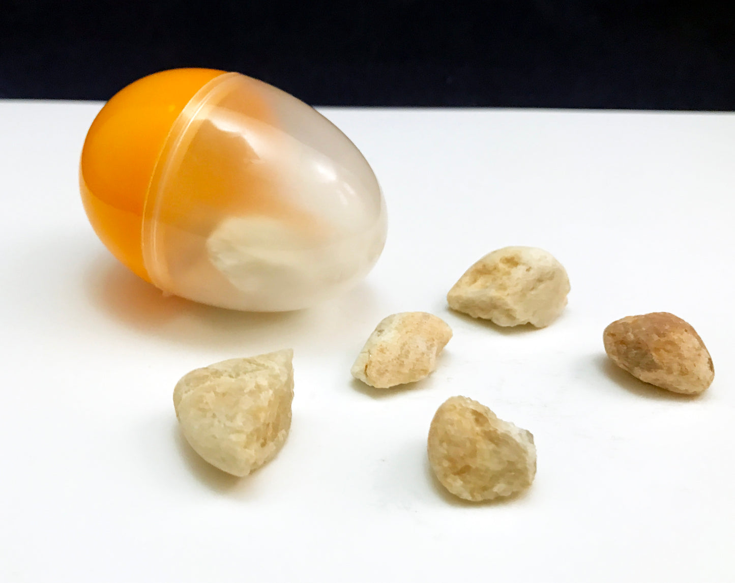 Make an Egg Shaker with pebbles