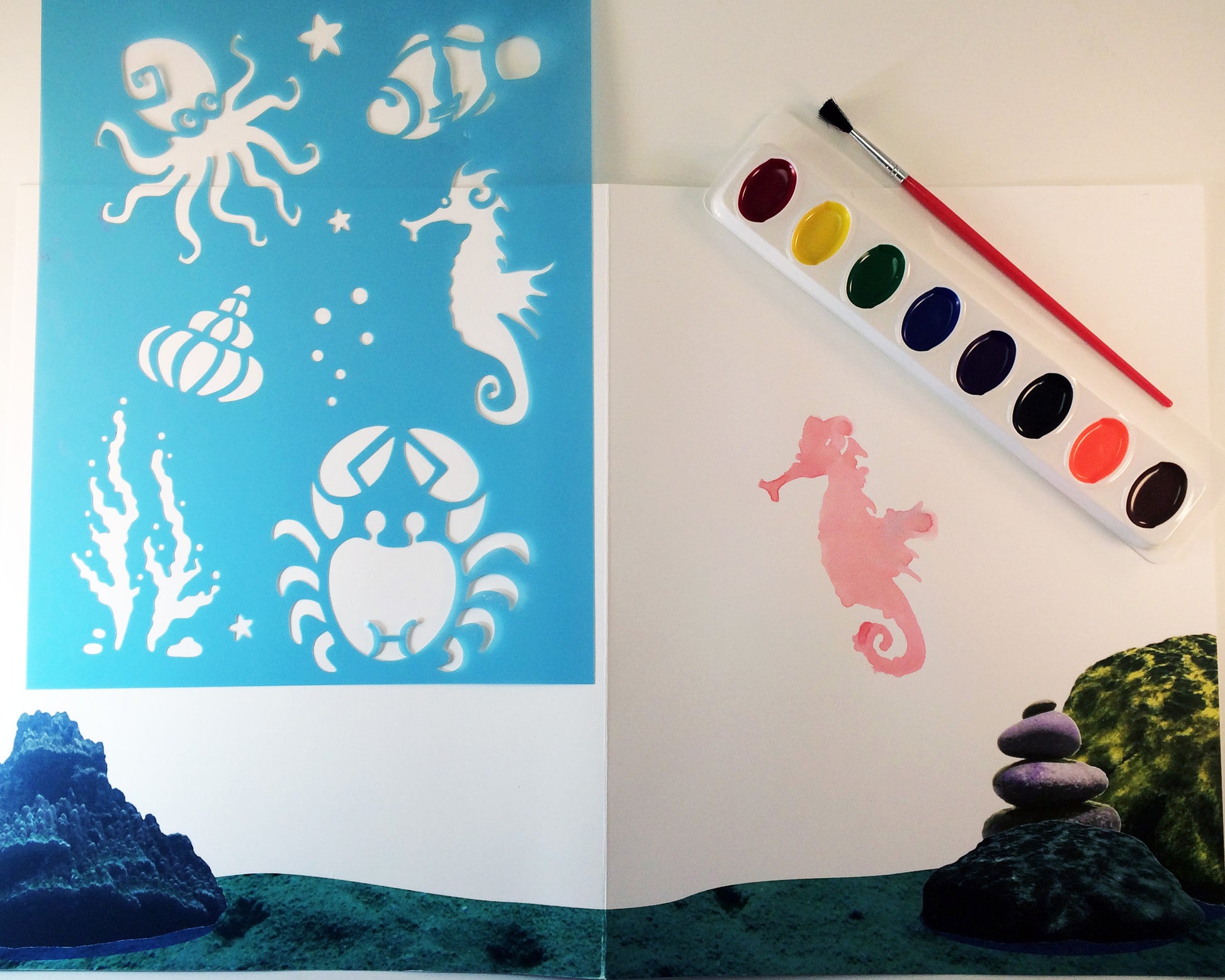 Art activity inspired by the book Over in the Ocean in a Coral Reef. Use stencils to paint an underwater scene with sea creatures, seashells, and coral. 