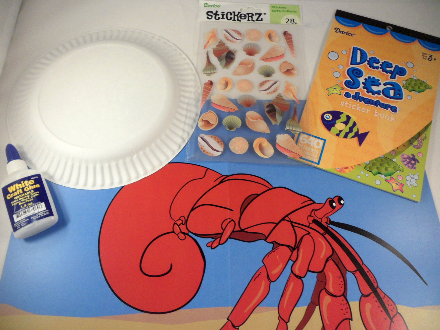 Decorate your own paper plate shells. A House for Hermit Crab - Ivy Kids subscription box activities